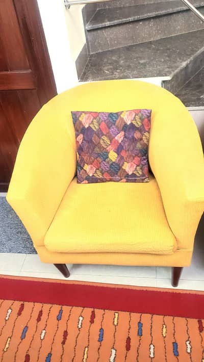 Two Chairs in mustard color.