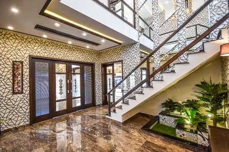 A beautifully designed 5 Marla house with a stunning ultra-modern elevation, located in the prime area of DHA 9 Town C Block.