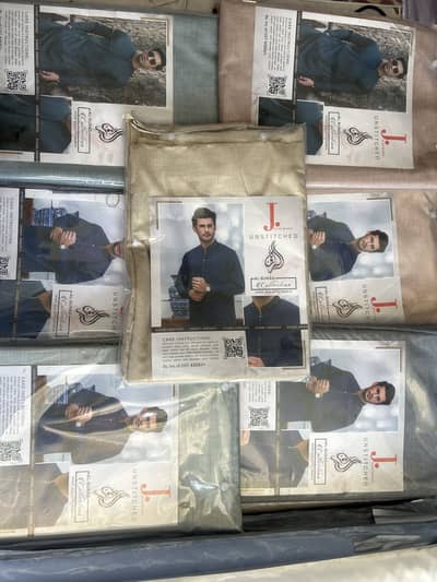 J. Unstitched 4 meters suit available
