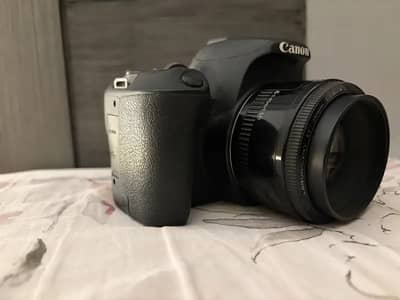 Canon EOS 200D with kit lens + 50mm lens