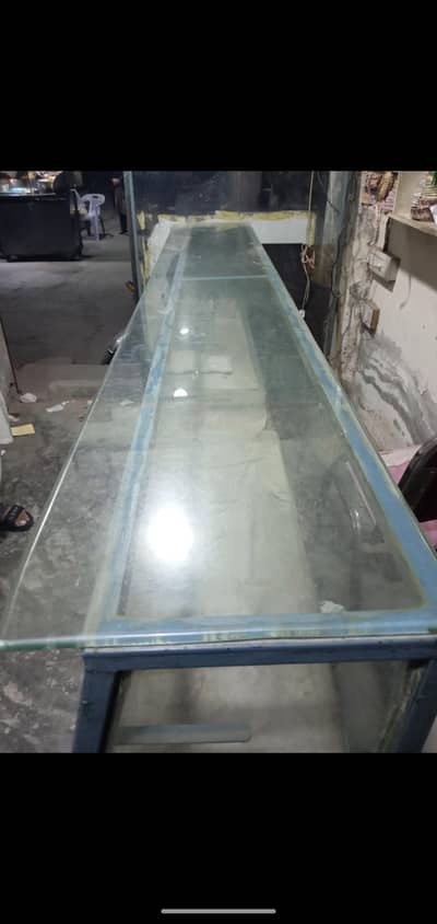counter for sale made with iron frame 8 fte length and 4 fte widht