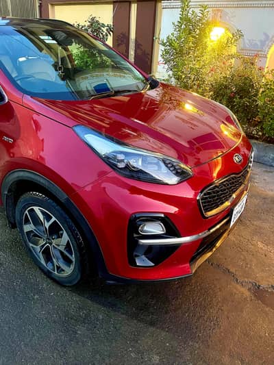 kia sportage AWD (TOTAL JENIUNE)