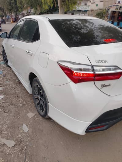 Toyota corolla altis grande 1.8 white with beige room