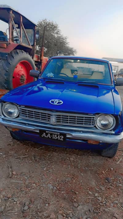 Toyota Corolla 1974 exchange possible with cherry QQ