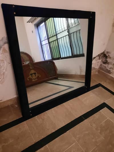 full size bed with site table