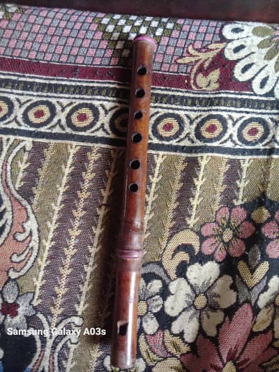 wooden flute with 6 holes
