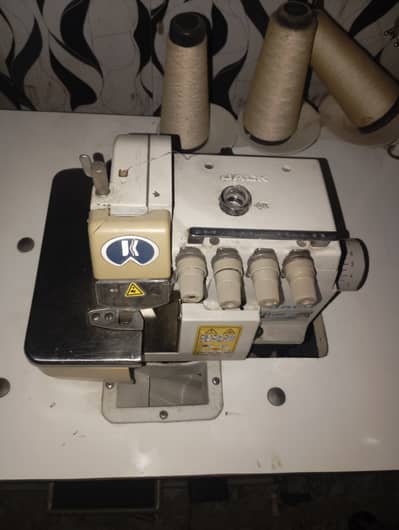 Over lock machine