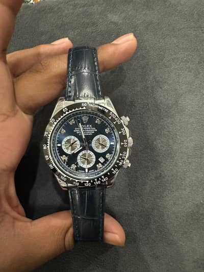Rolex watch black strap in black dial