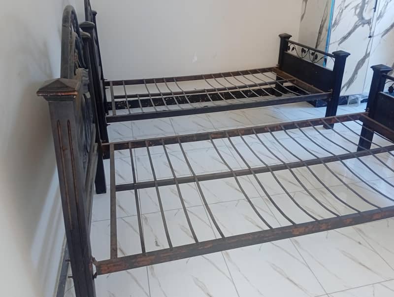 2 single bed wooden plus iron 1