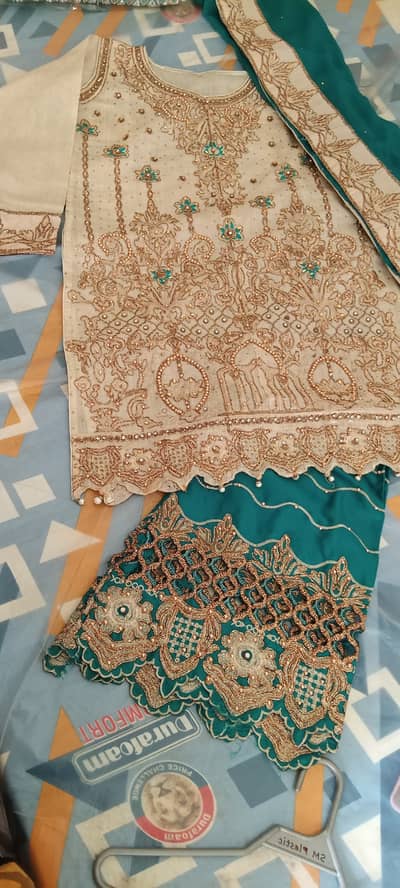 Off white and teal green fancy suit