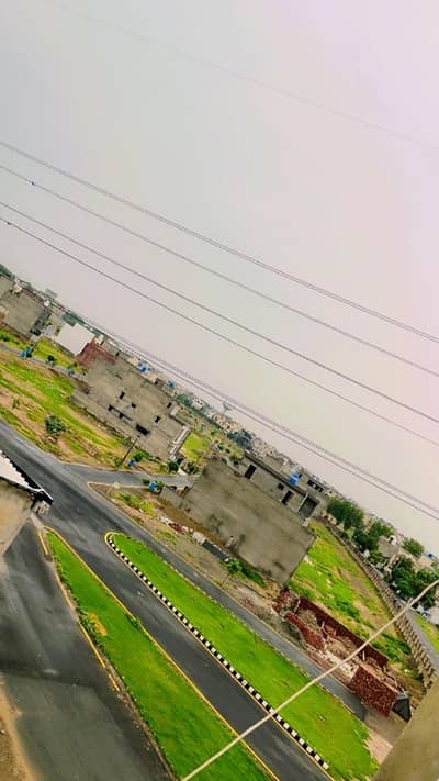 21 MARLA FACING PARK PLOT FOR SALE IN LAKE CITY M2