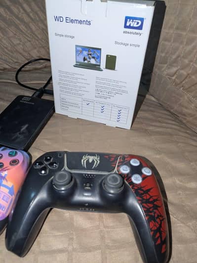 2 playstation controller and  750gb hardrive