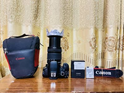 Canon Eos 700d with 18-135mm is stm lens and accessories(not exchange)