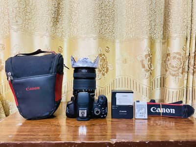 Canon Eos 700d with 18-135mm is stm lens and accessories(not exchange)