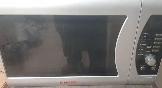 singer microwave oven. . . cook+ heat