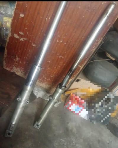 125 front shock geniune