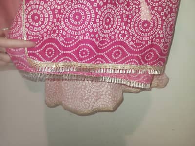 beautiful embroidery on neck with golden leas