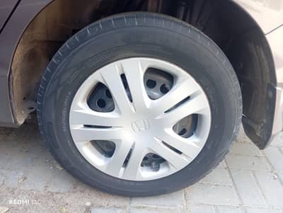 Dunlop 3 or seiberling 1 . . . . 185 65 15 hona city