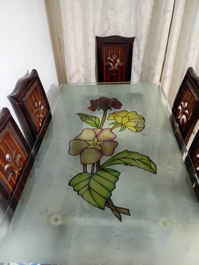 a pure furnish dining table with good condition wooding.