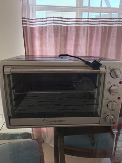 Grilled and baking oven