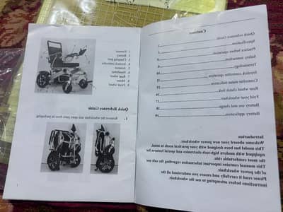 Electric wheel chair just like new all controls in one hand