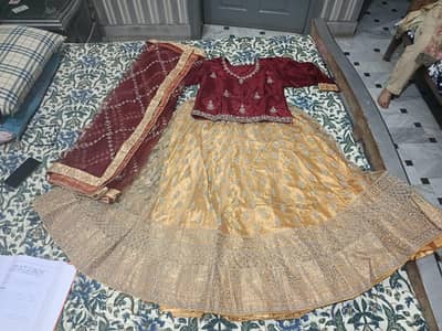 Very beautiful  bridal style golden lehenga with Red shirt