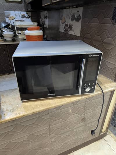 Dawlance Microwave  Grill, Heat, Bake Model No. DW-131 HP