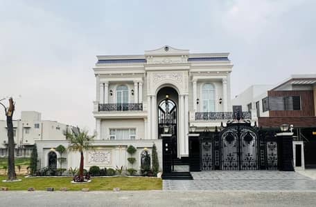 One Kanal Brand New Spanish Design Most Beautiful Full Basement Semi Furnished Bungalow For Sale At Prime Of DHA Lahore Near To Park Masjid & Commercial Market.