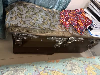 I am selling my  king size bed and  side table 38 k