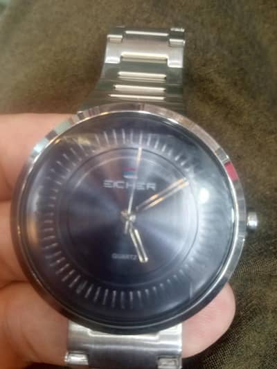Either men watch  . almost new