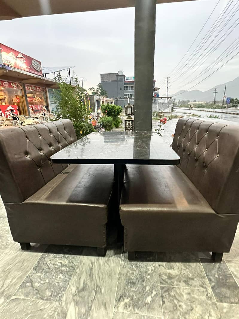 brown sofe and table 0