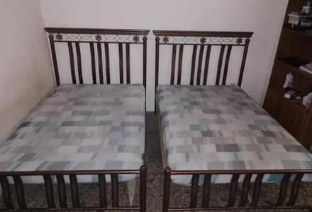 Used iron bed
