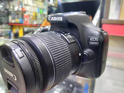 DSLR CANON 1300D WITH 18-55. . ZUBAIR 03102994950