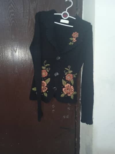 black embroidered sweater