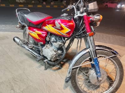 honda 125 red colour urgent sale