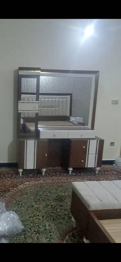 bed with drawer or dressing