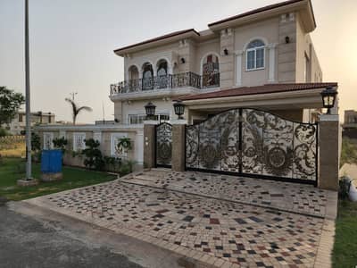 20 MARLA ELEGANT AND FULLY MAINTAINED SUPER HOT LOCATED BUNGALOW IS AVAILABLE IN THE BEST BLOCK OF DHA LAHORE.