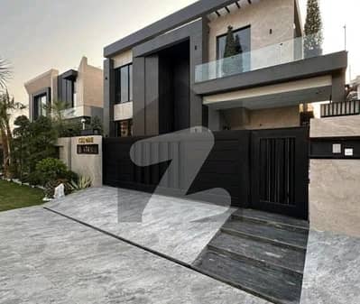 BRAND NEW 1-KANAL ELEGANT AND SUPER HOT LOCATED BUNGALOW WITH BASEMENT IS AVAILABLE IN THE BEST BLOCK OF DHA LAHORE.