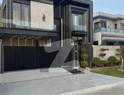 BRAND NEW 1-KANAL ELEGANT AND SUPER HOT LOCATED BUNGALOW IS AVAILABLE IN THE BEST BLOCK OF DHA LAHORE