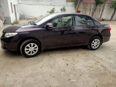 2012 Toyota GLI Lahore Registered New Tyres Home Used