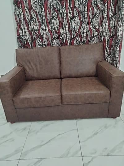 heavy leather 2 seater sofas in new condition