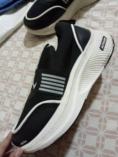 Stylish SOLM black sneakers for sale excellent condition