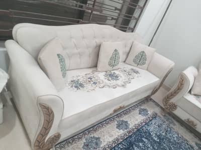 7 seater almost new sofa set with 2 new style  tables