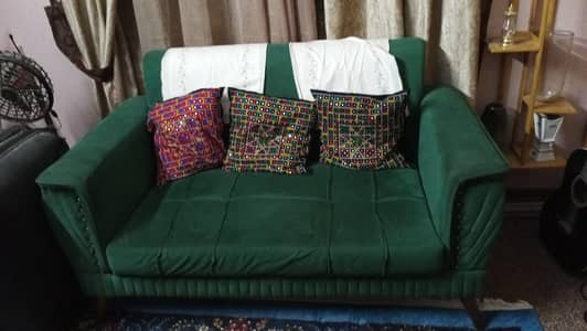 2 seater sofa along with 2 side chairs