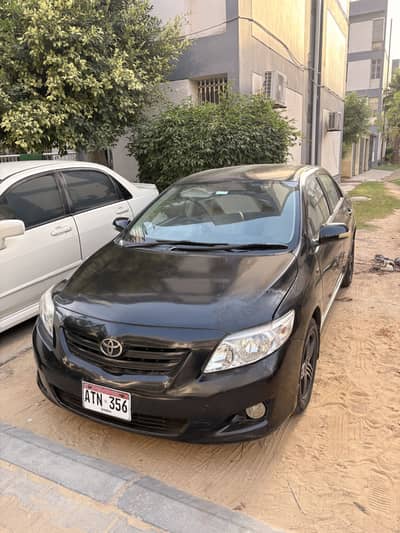 Toyota Corolla black 2010