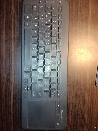 Microsoft All in one multimedia Keyboard + Trackpad.