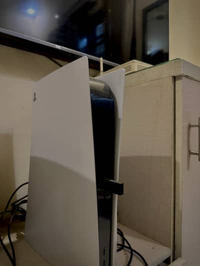 PS5 with headset and Dual-sense Edge