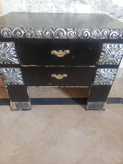 bed and mattress and side tables