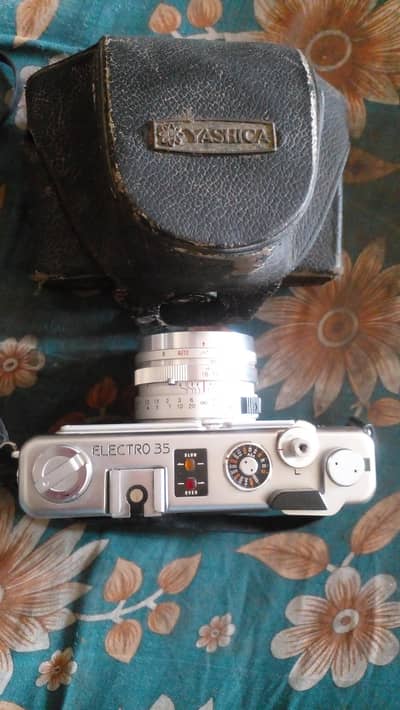 yashica electro 35-canon shoreshot-nikon-konica pop-pentax
