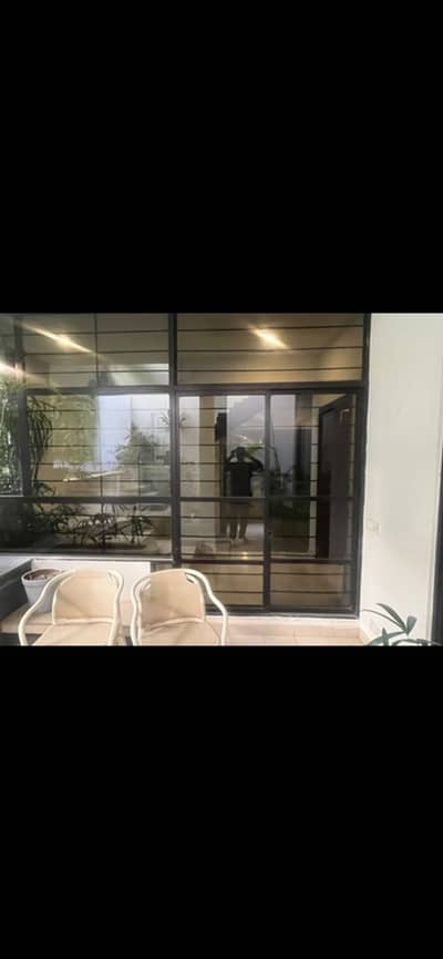 Aluminium window with Glass and grill for sale.